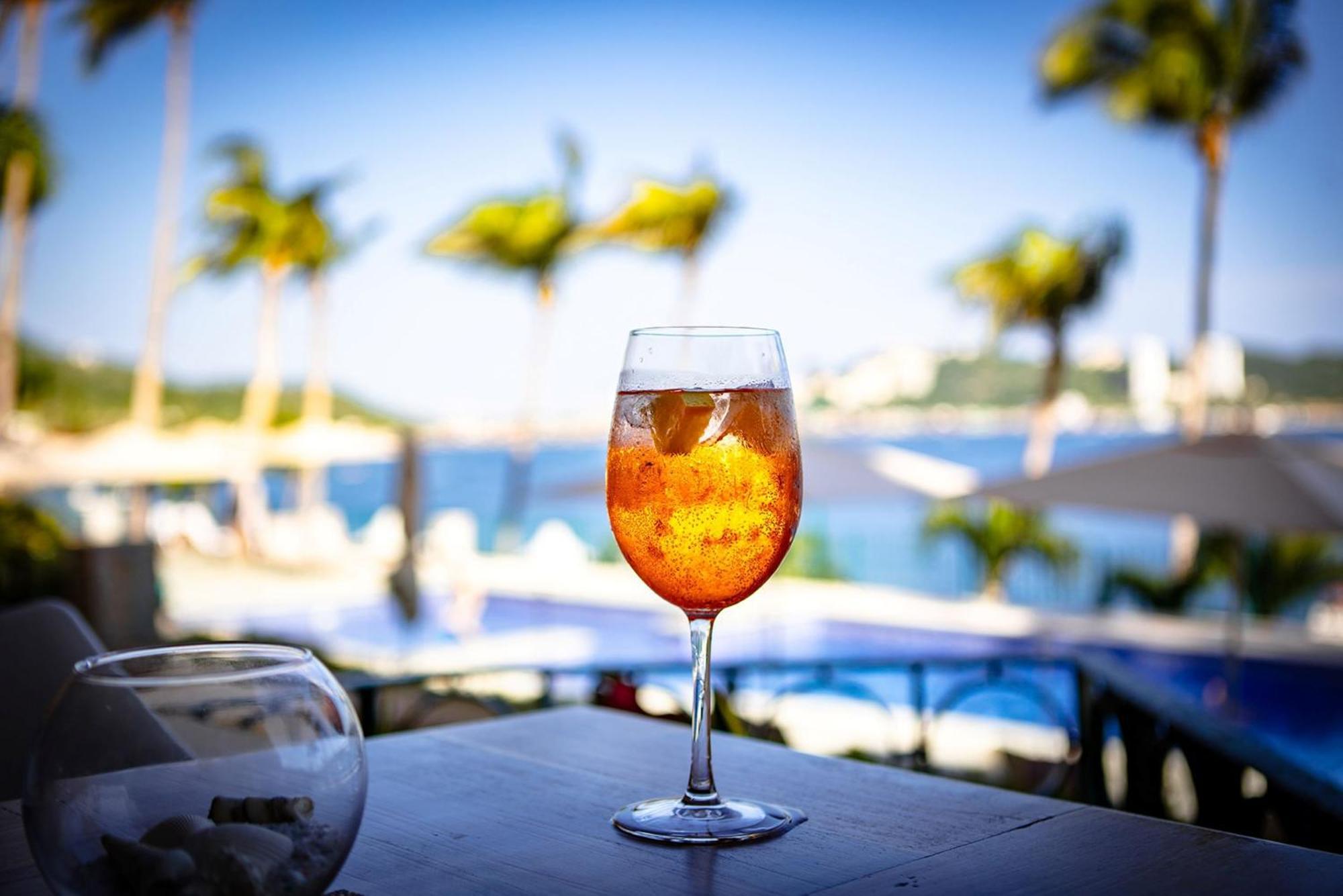 Camino Real Acapulco Diamante Hotel Exterior photo A glass of Aperol Spritz